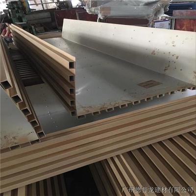 长城铝板与木纹凹凸长城板在售楼部营销中心的装饰魅力